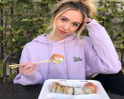 Ember Johnson eating non vegetarian food